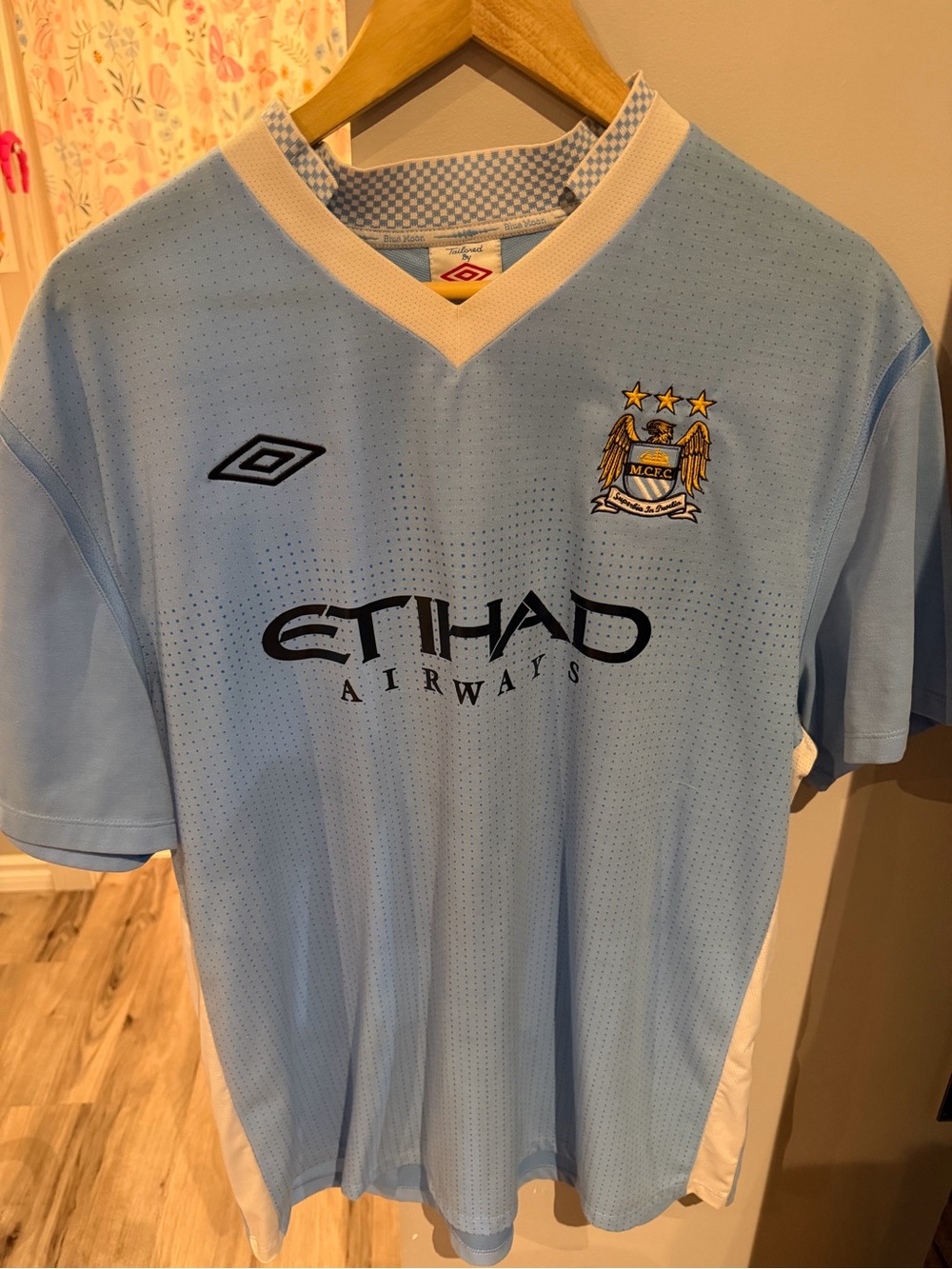 Umbro Light Blue Men's Football Jersey with Black Sponsor Logo